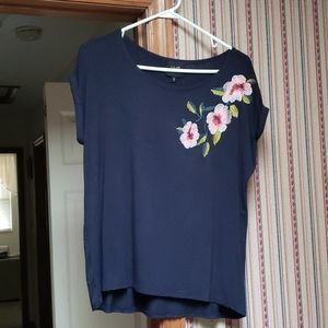 Top with embroidery flowers on upper left side